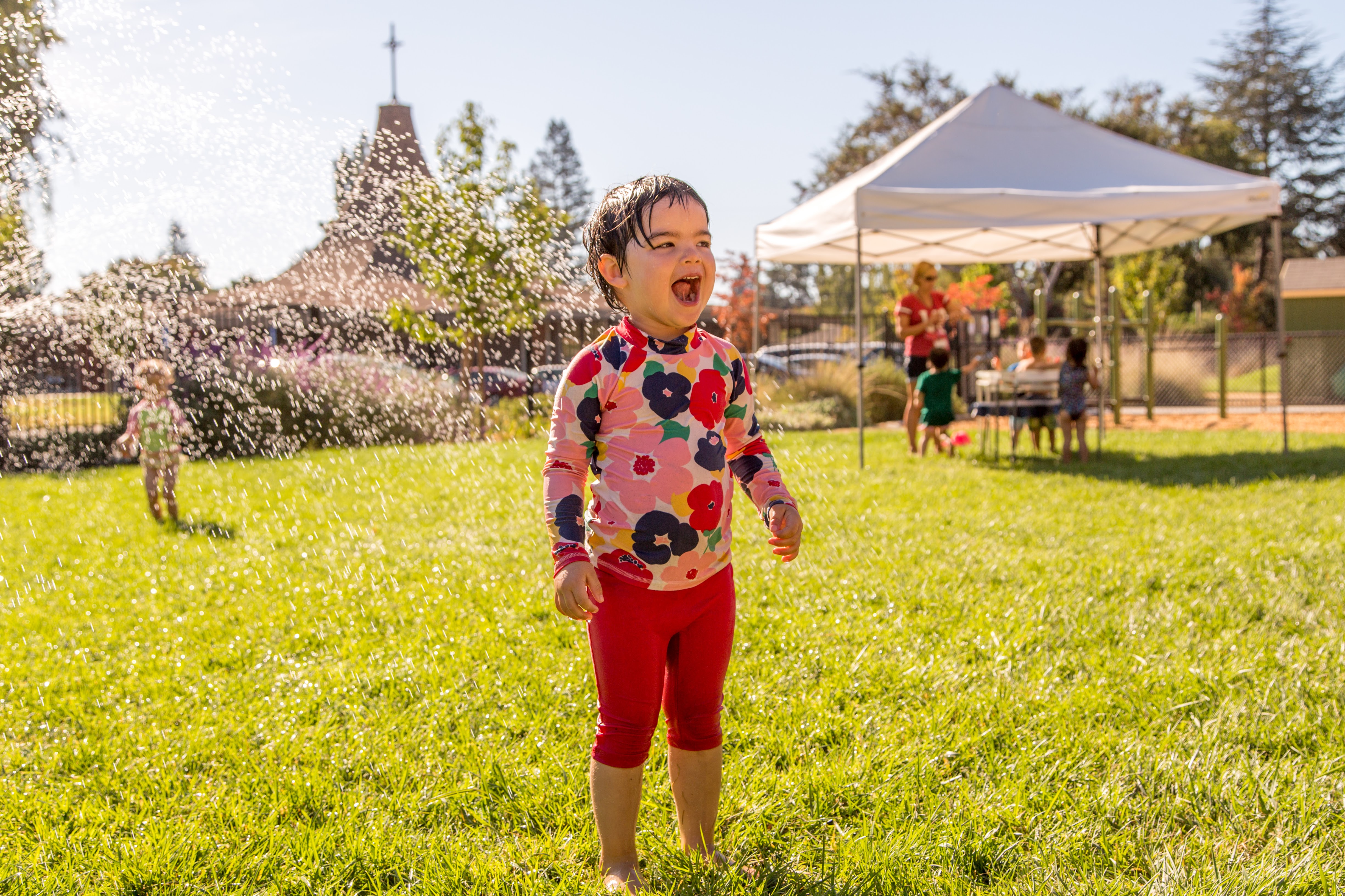 child enjoying water play