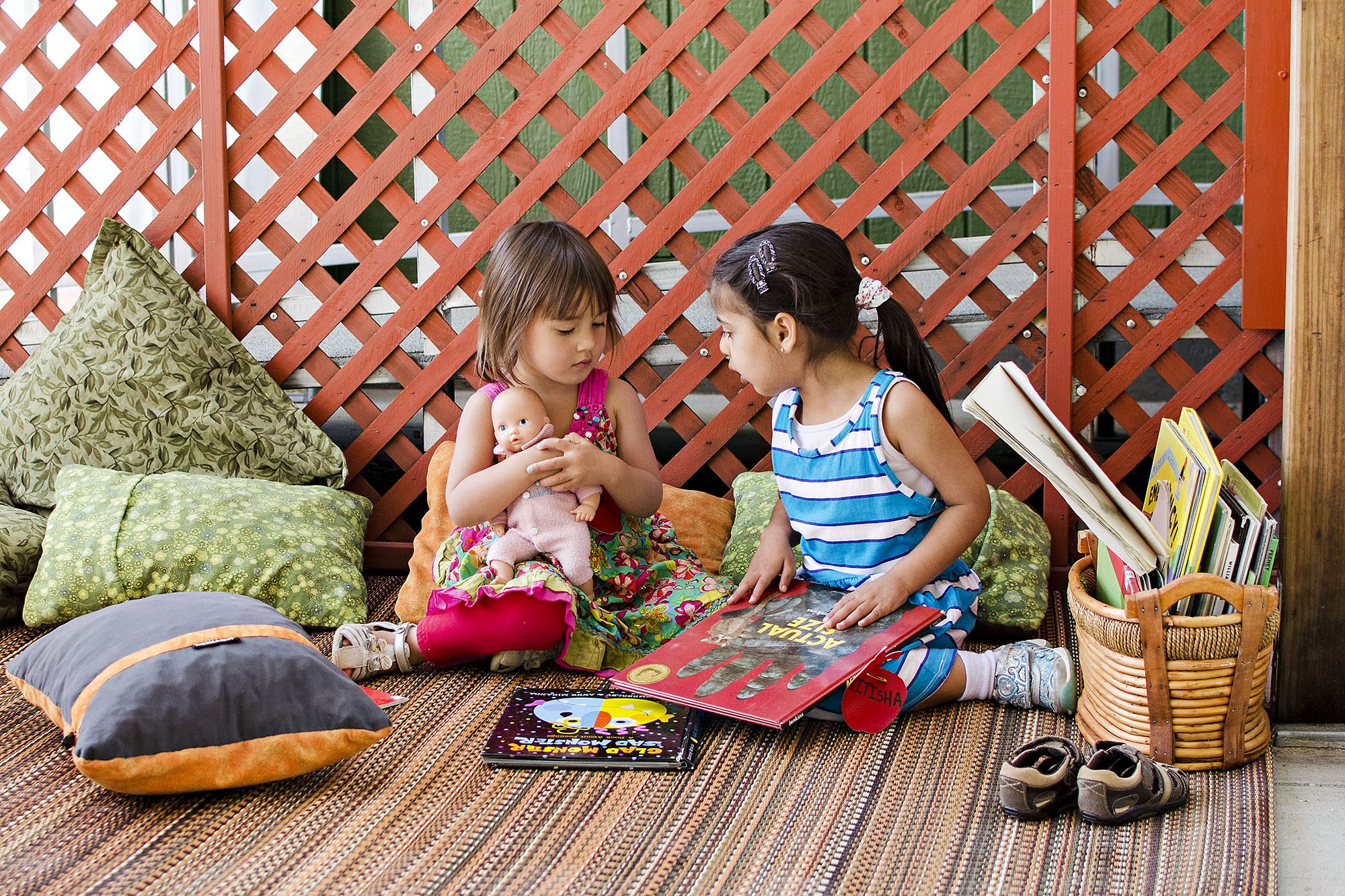 Children reading a book together