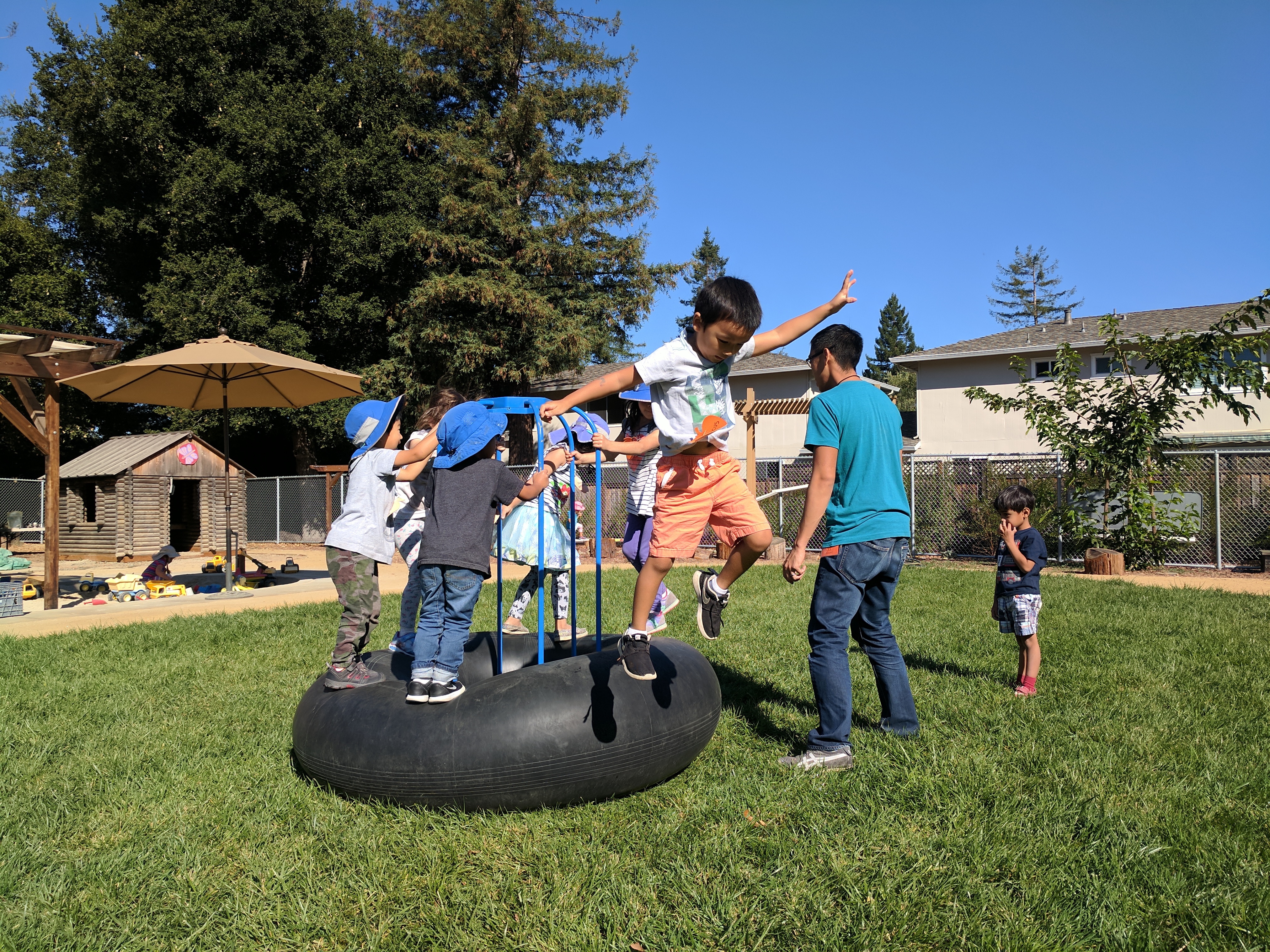 children playing in school garden